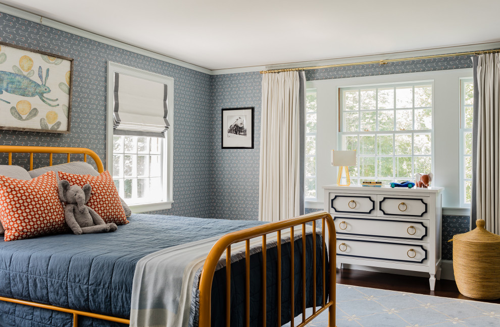 Inspiration for a traditional kids' bedroom for boys in Boston with blue walls, dark hardwood floors, brown floor and wallpaper.