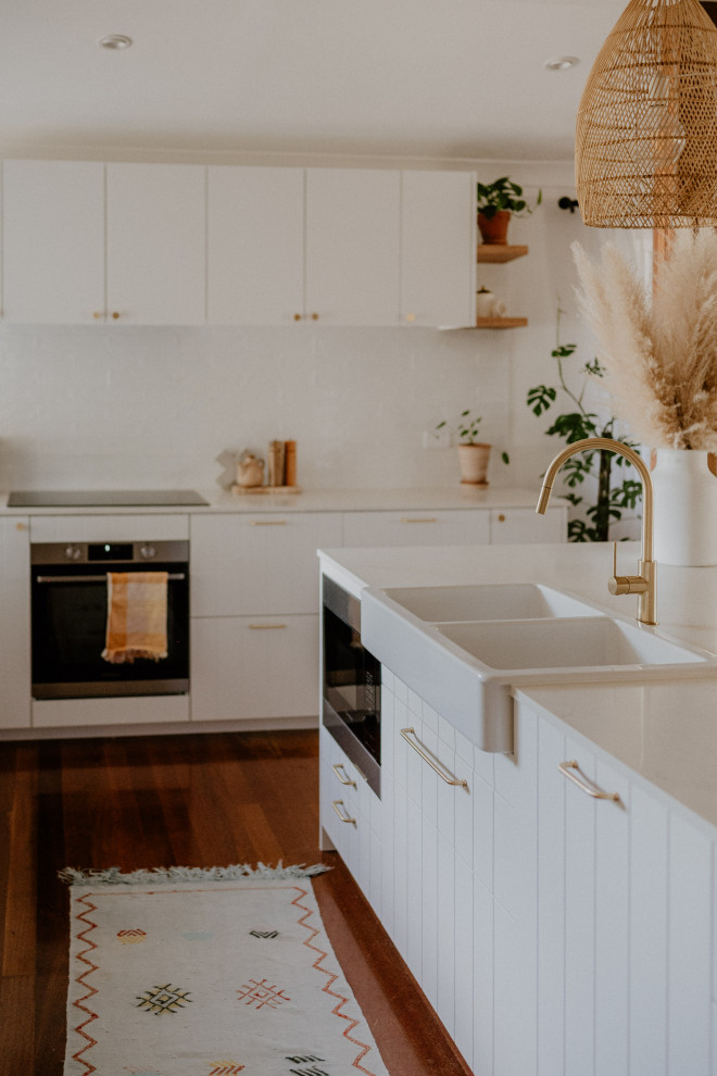 Design ideas for a beach style kitchen in Brisbane.