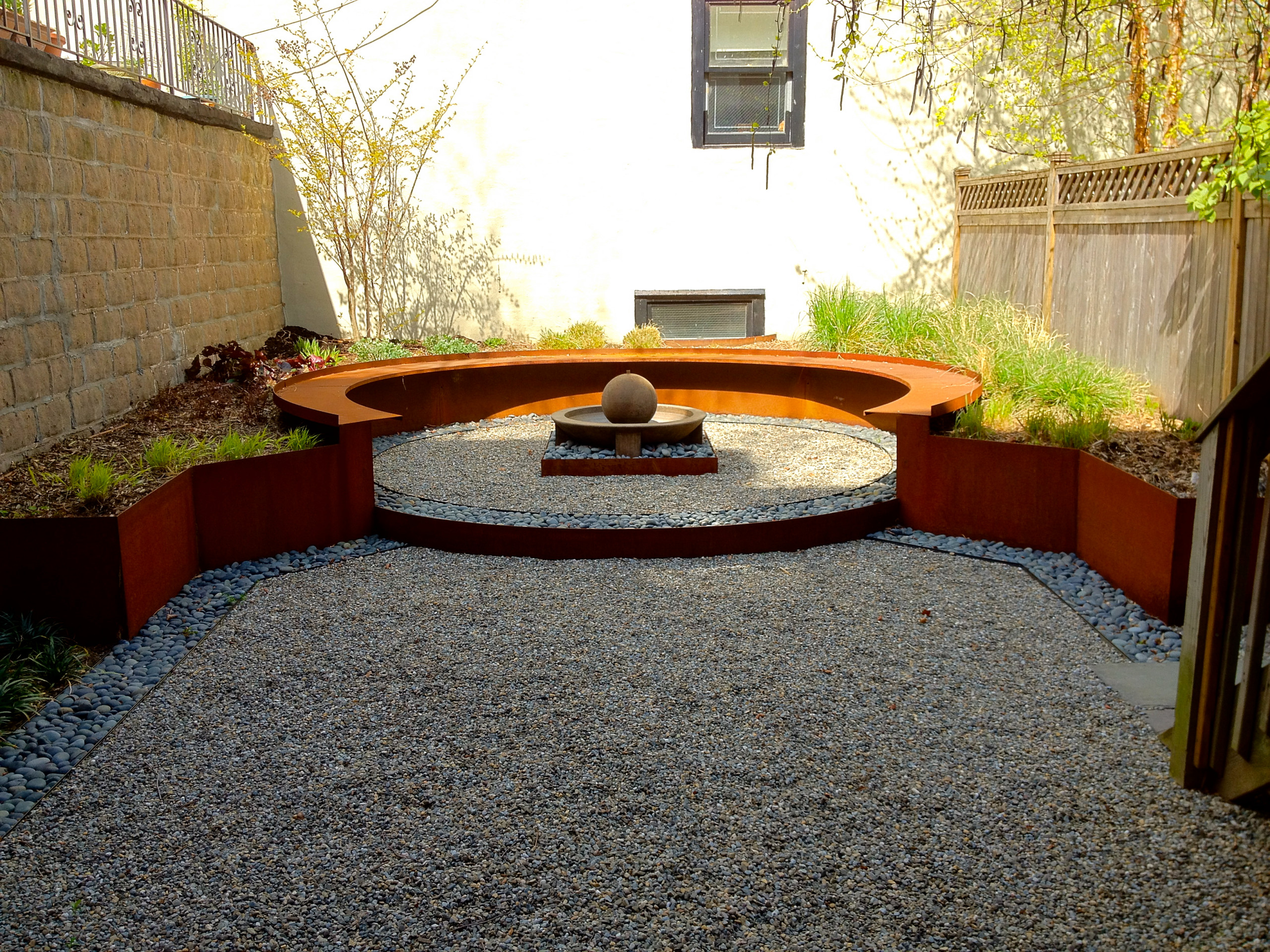 Corten planter with spring plantings