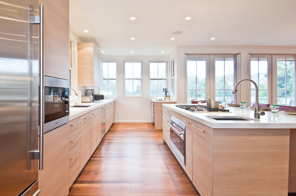 Contemporary kitchen in New York with stainless steel appliances.