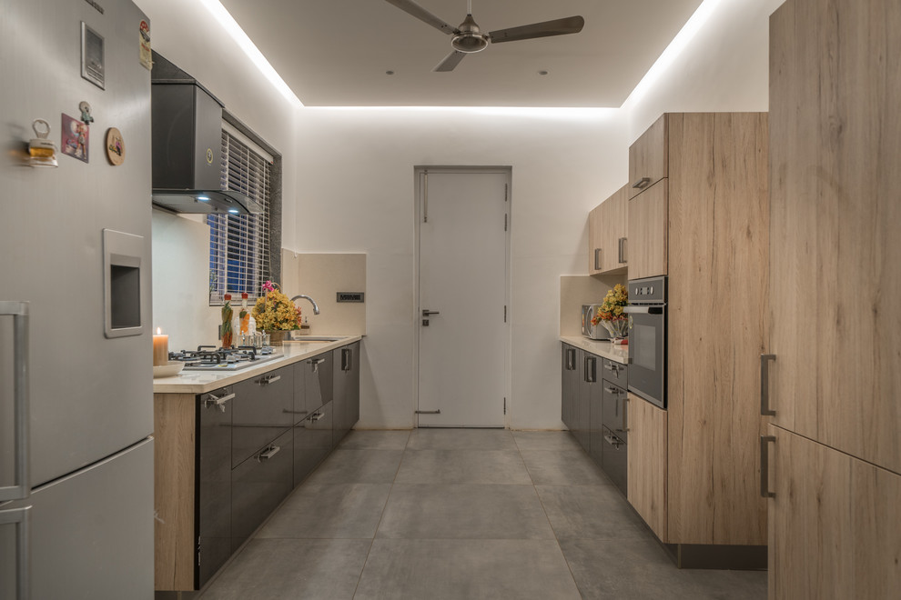 This is an example of a contemporary kitchen in Hyderabad.