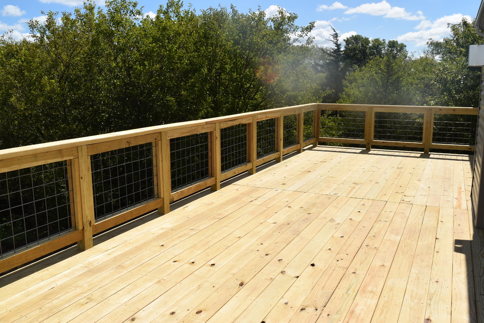 Deck - large transitional backyard deck idea with no cover