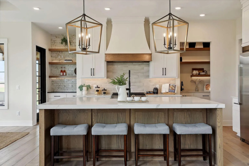 This is an example of a transitional kitchen in Minneapolis.