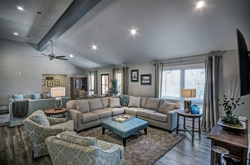 This is an example of a country family room in Jackson.