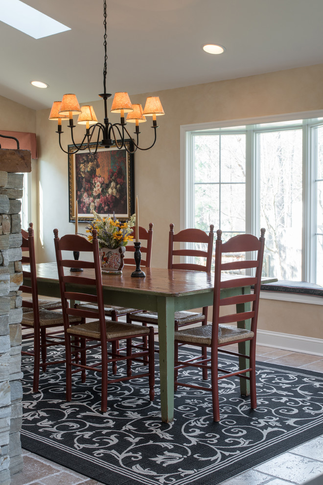 Design ideas for a mid-sized traditional separate dining room in Wilmington with travertine floors and multi-coloured floor.