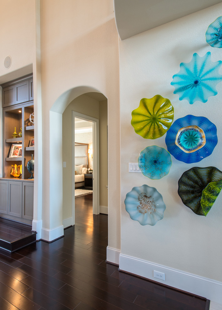 Entry hall - large transitional dark wood floor and brown floor entry hall idea with beige walls