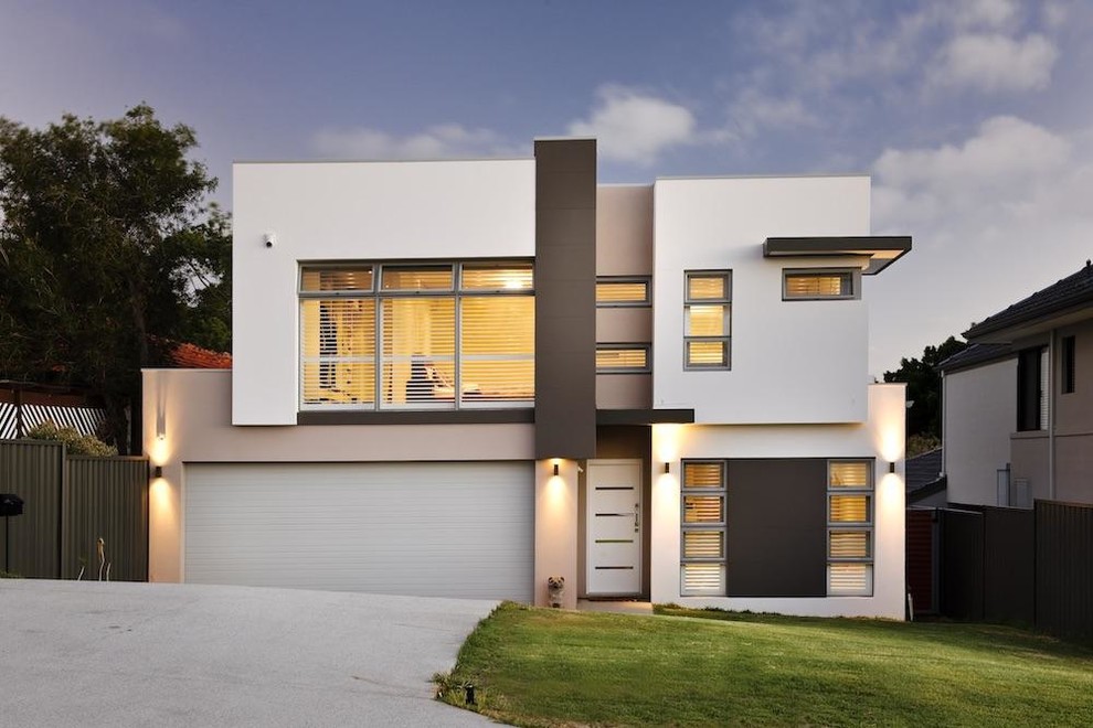 Photo of a contemporary two-storey white exterior in Perth with a flat roof.