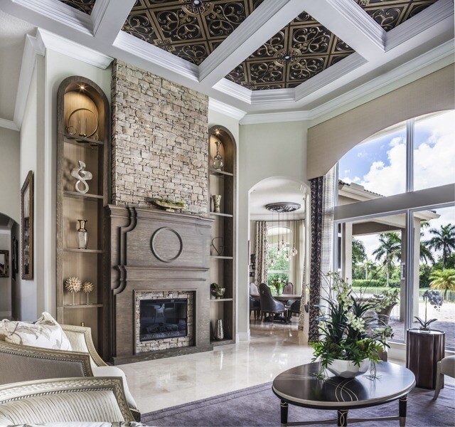 Photo of a large transitional formal open concept living room in Miami with marble floors, a standard fireplace, a stone fireplace surround and beige floor.