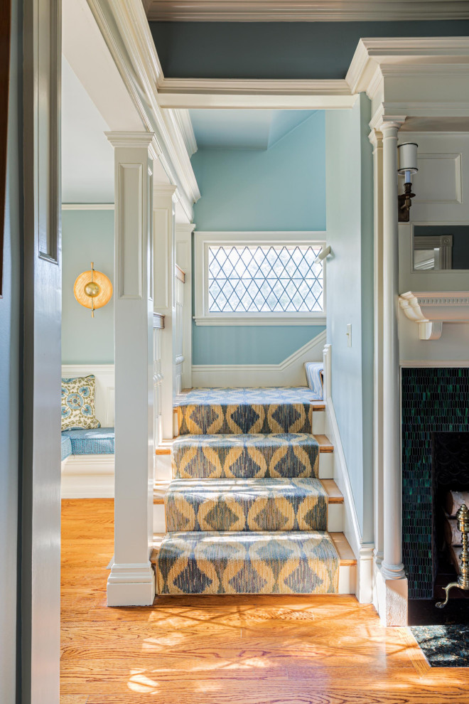 Inspiration for a mid-sized transitional hallway in Boston with medium hardwood floors.