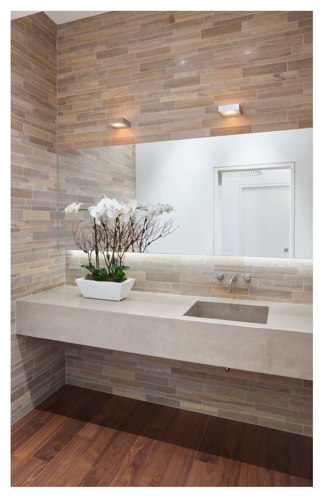Design ideas for a large contemporary master bathroom in Bridgeport with beige tile, stone tile, multi-coloured walls, medium hardwood floors and an undermount sink.