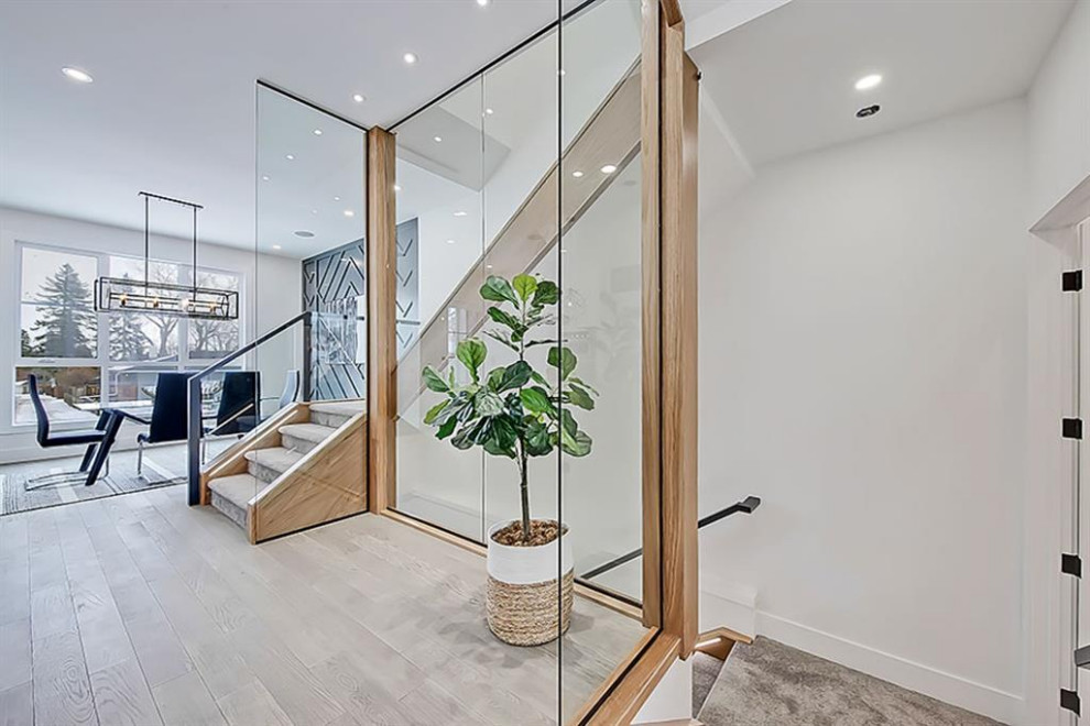 Transitional home design photo in Calgary
