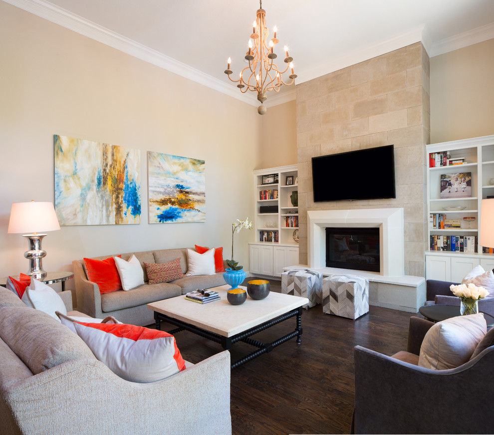 Inspiration for a transitional formal living room in Dallas with beige walls, dark hardwood floors, a standard fireplace and a wall-mounted tv.
