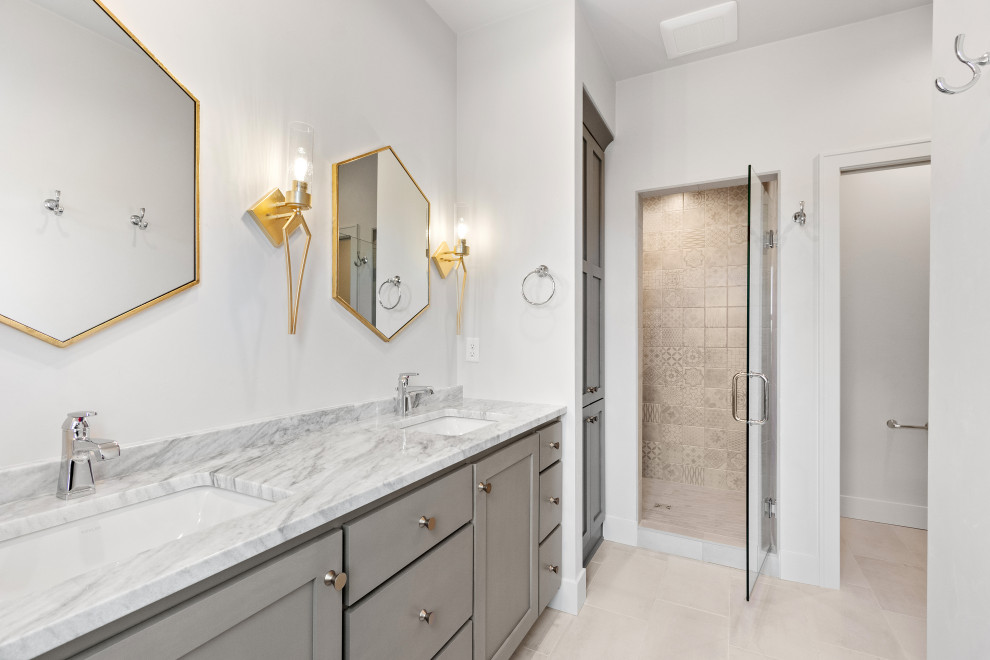 Design ideas for a mid-sized country master bathroom in Other with shaker cabinets, grey cabinets, an alcove shower, a two-piece toilet, white walls, ceramic floors, an undermount sink, marble benchtops, a hinged shower door, multi-coloured benchtops, a double vanity and a built-in vanity.