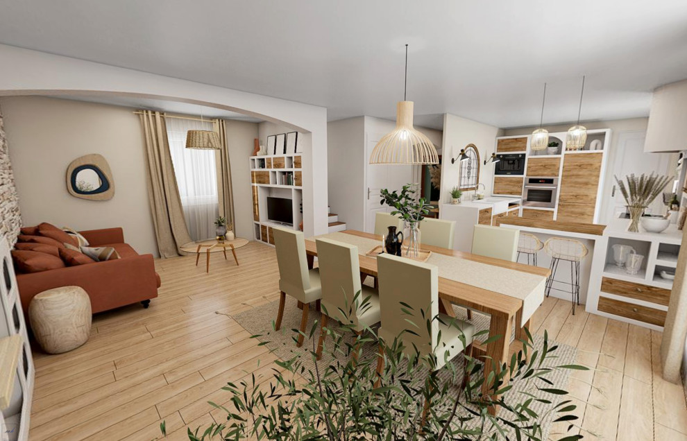 This is an example of a mediterranean open plan living room in Marseille with beige walls, light hardwood flooring, no fireplace and brick walls.