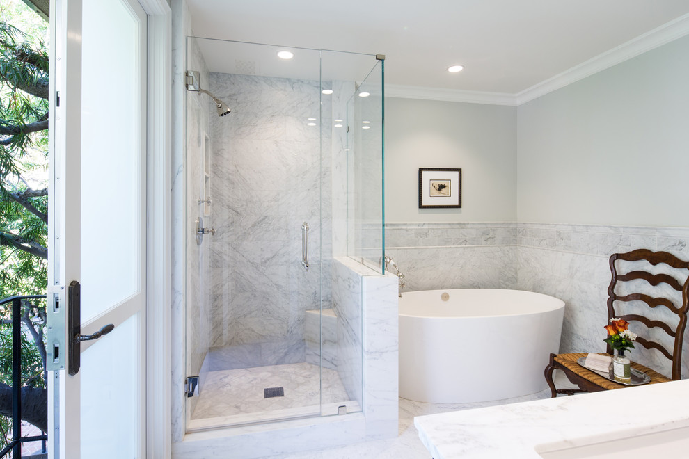 Inspiration for a timeless white tile and stone slab bathroom remodel in Los Angeles