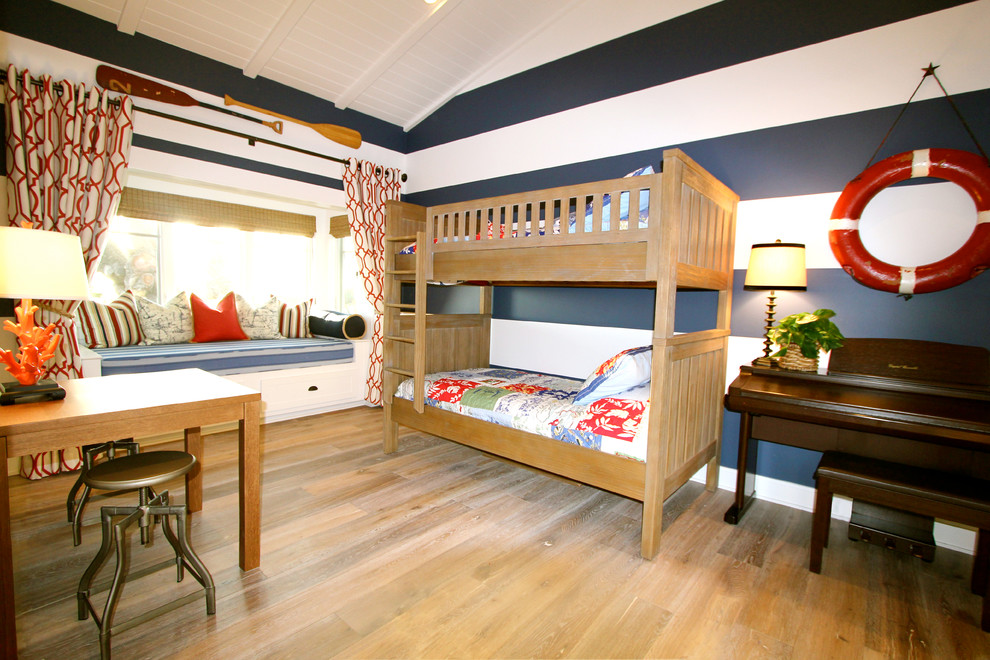 Photo of a beach style kids' room in Orange County.