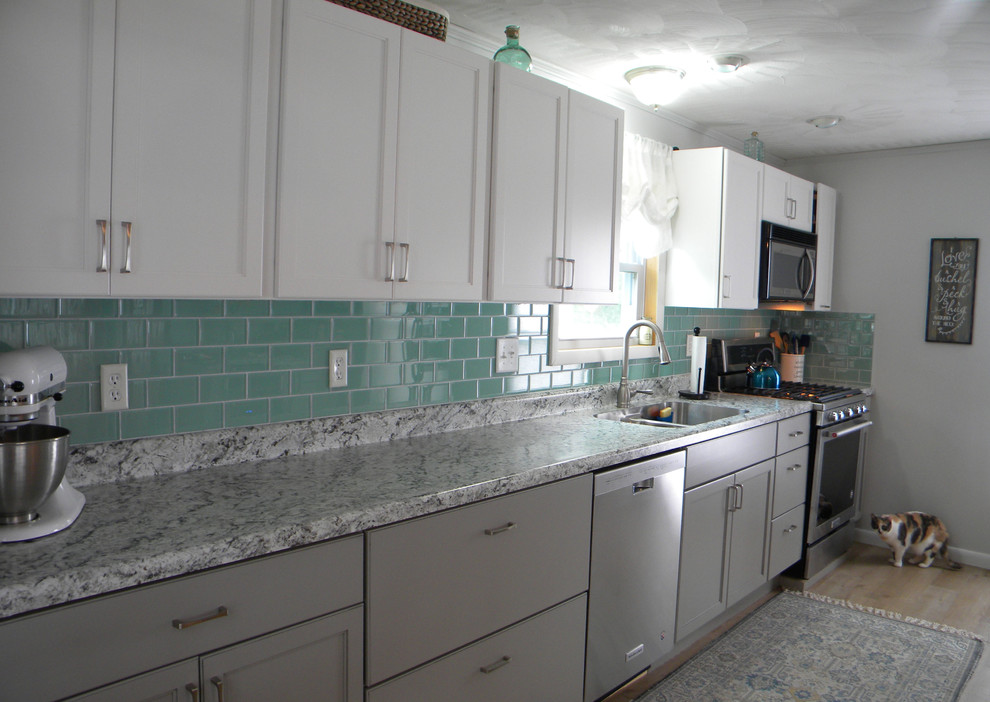 Kitchen pantry - large transitional single-wall kitchen pantry idea with a drop-in sink, recessed-panel cabinets, white cabinets, stainless steel appliances and no island