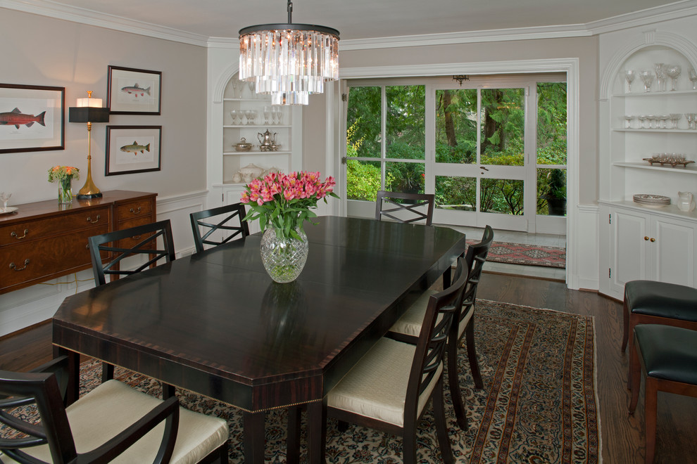 Inspiration for a large traditional separate dining room in Seattle with beige walls, dark hardwood floors, no fireplace and brown floor.