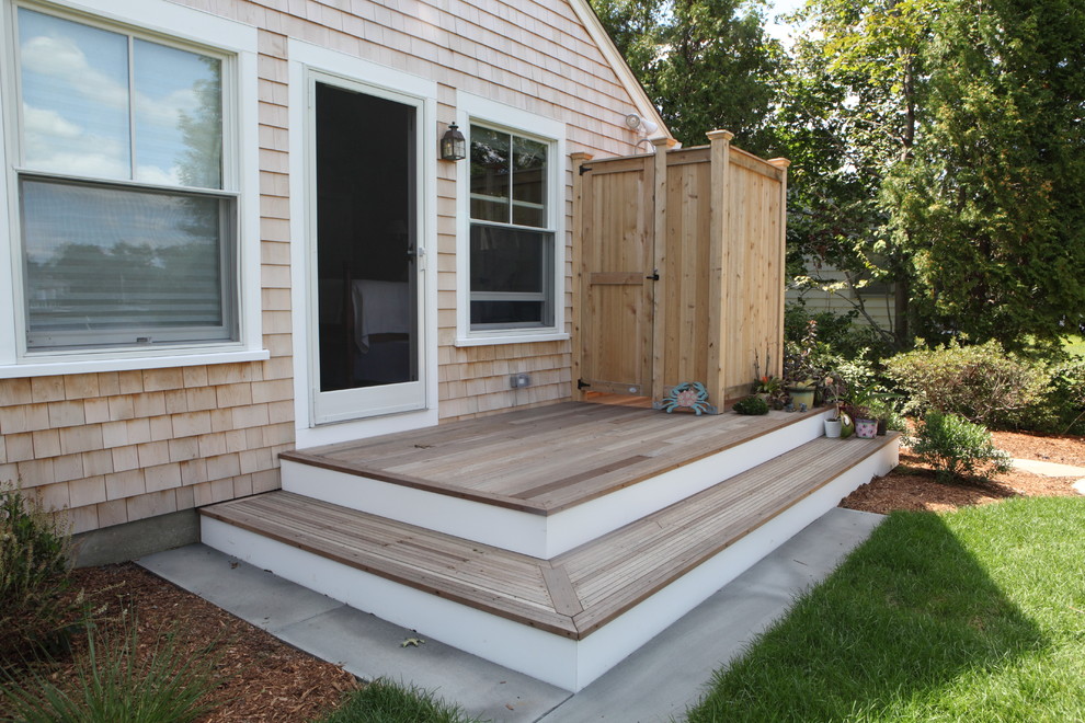 Inspiration for a small beach style backyard deck in Providence with an outdoor shower.