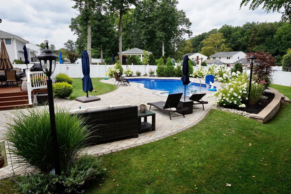 Manalapan, NJ: Freeform Pool Installation with Hydrangea Rock Garden & Seating