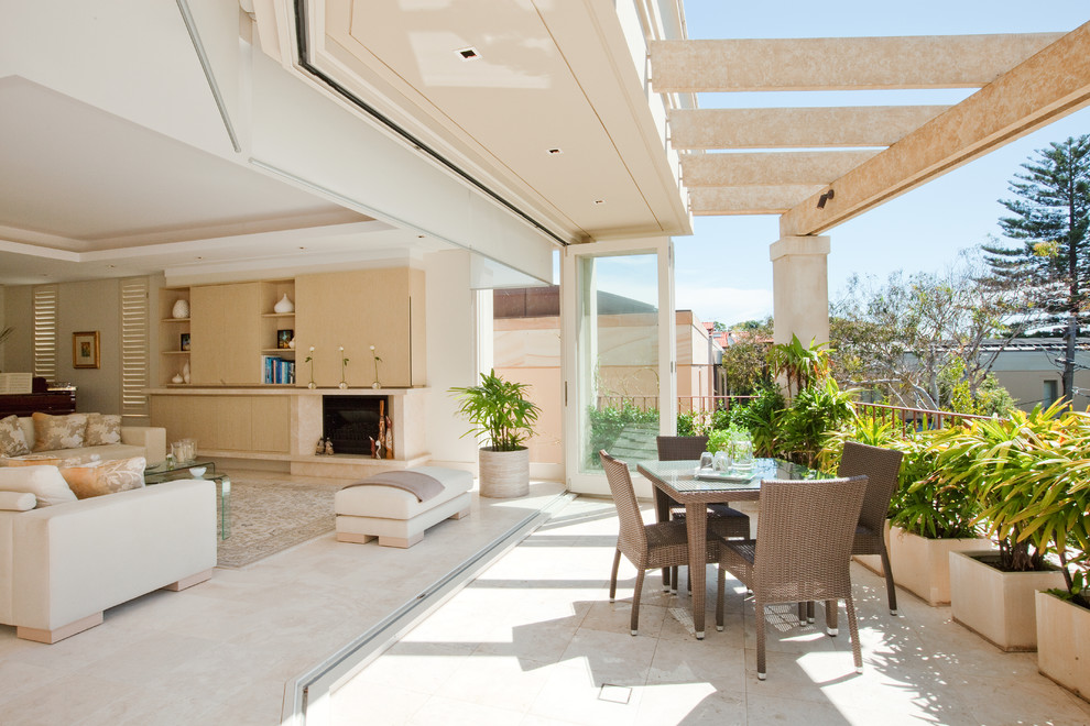 Design ideas for a transitional backyard balcony in Sydney with a pergola.