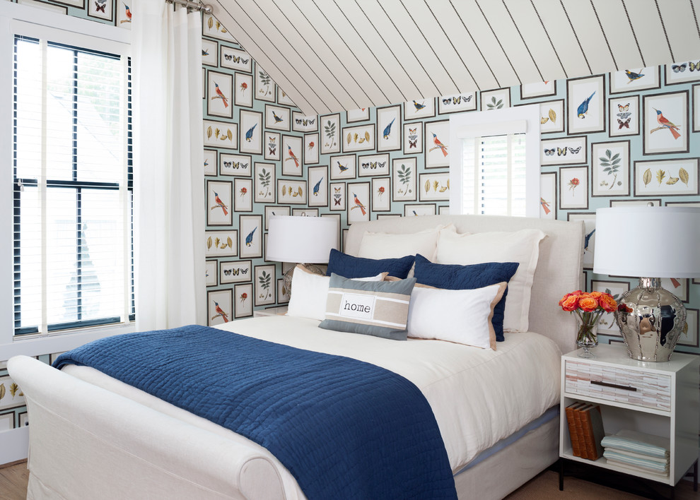 This is an example of a beach style bedroom in DC Metro with multi-coloured walls.