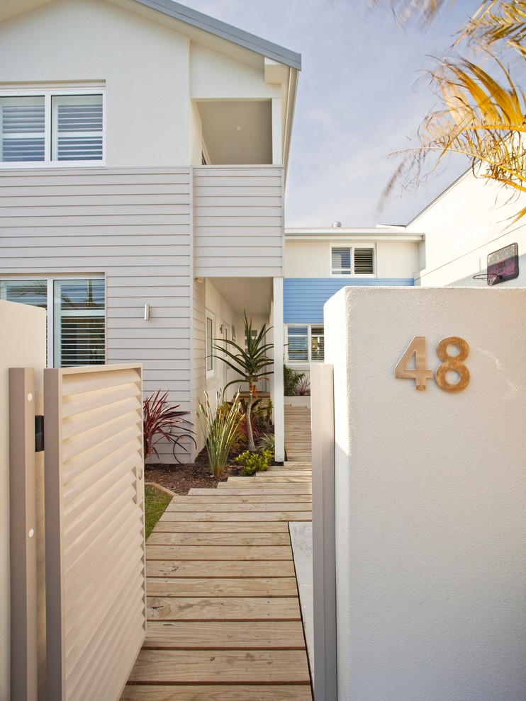 This is an example of a beach style entryway in Sydney.