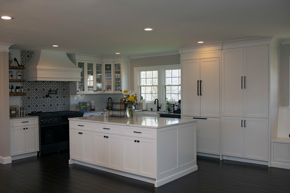 Inspiration for a large transitional l-shaped eat-in kitchen remodel in DC Metro with shaker cabinets, white cabinets and an island