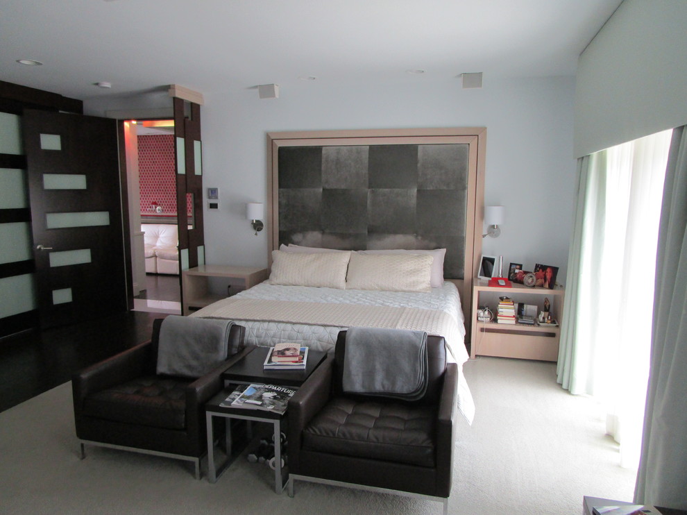 Mid-sized eclectic master bedroom in Miami with white walls, carpet and beige floor.