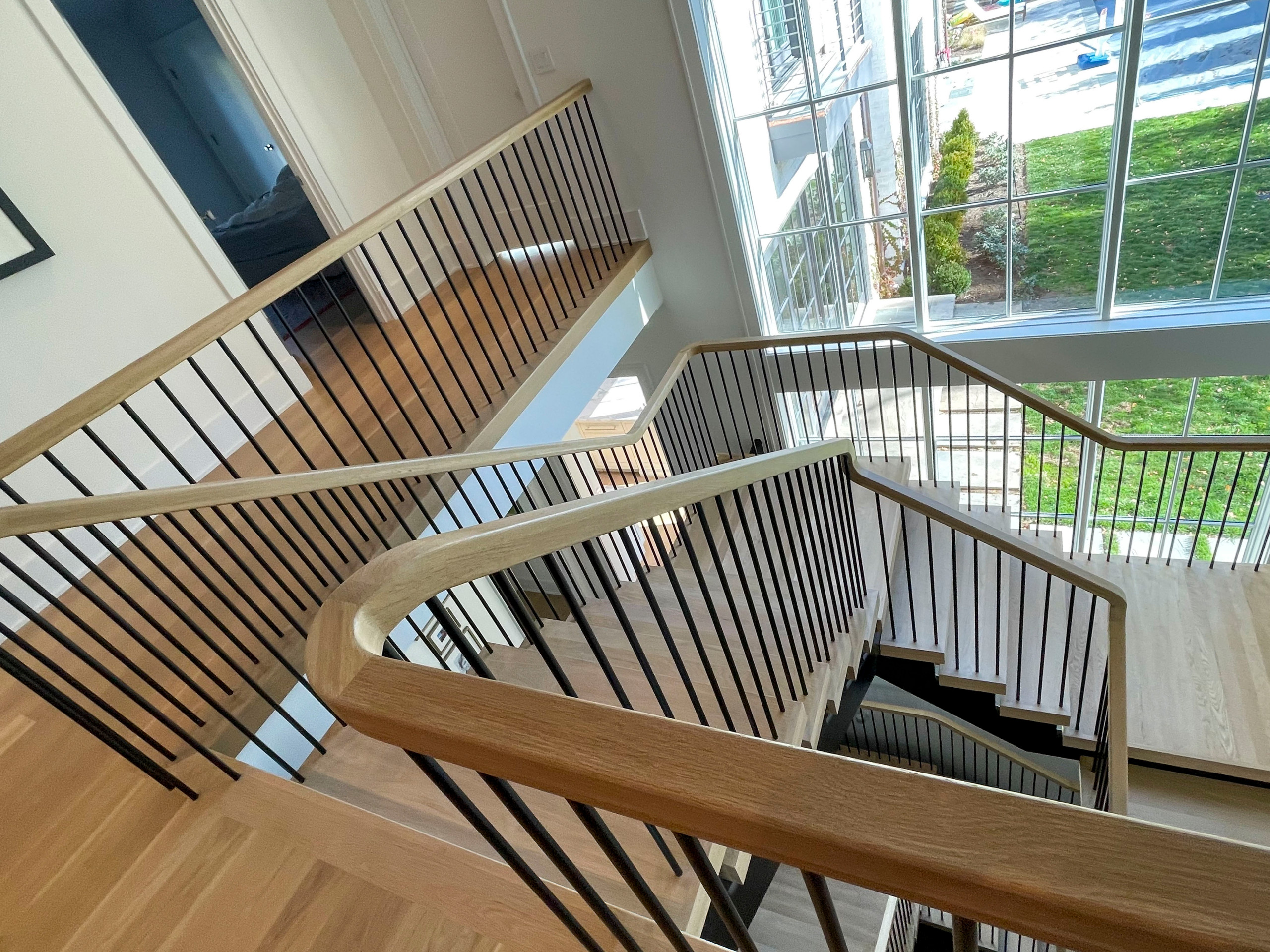 96_Dramatic cantilevered no-riser staircase, Bethesda, MD 20814