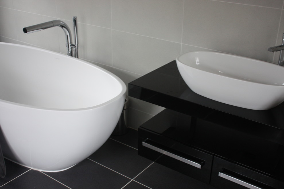 Inspiration for a contemporary bathroom in Essex with a freestanding tub.