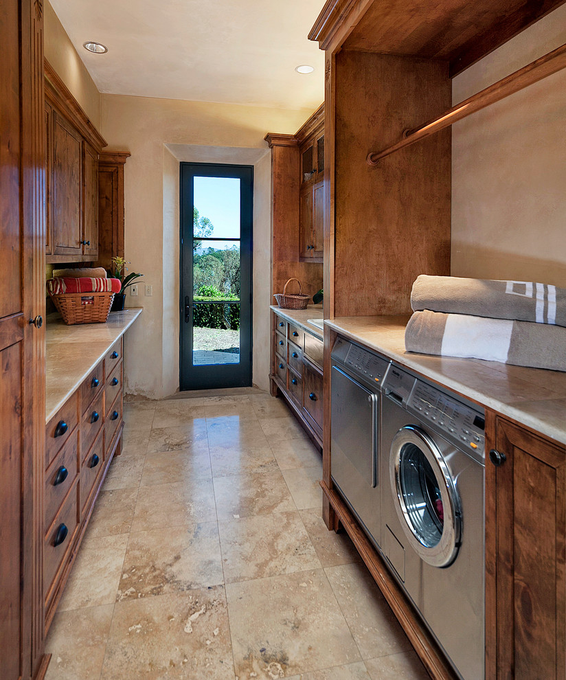 Photo of a mediterranean laundry room in Santa Barbara.