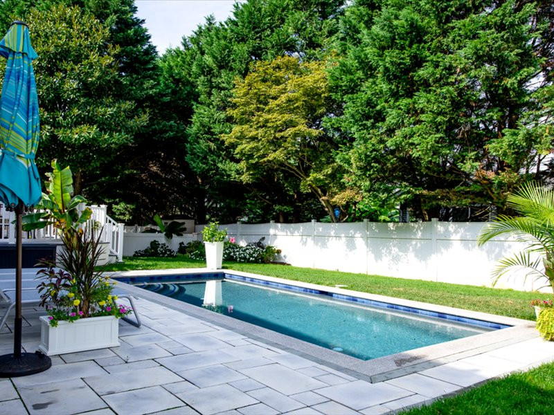 Pool - small transitional backyard concrete paver and rectangular pool idea