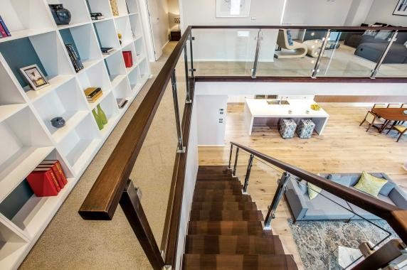 Inspiration for a large contemporary wood straight staircase in Melbourne with open risers and mixed railing.