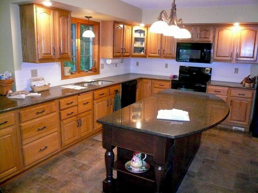 Photo of a mid-sized modern l-shaped eat-in kitchen in Other with a double-bowl sink, medium wood cabinets, black appliances and with island.