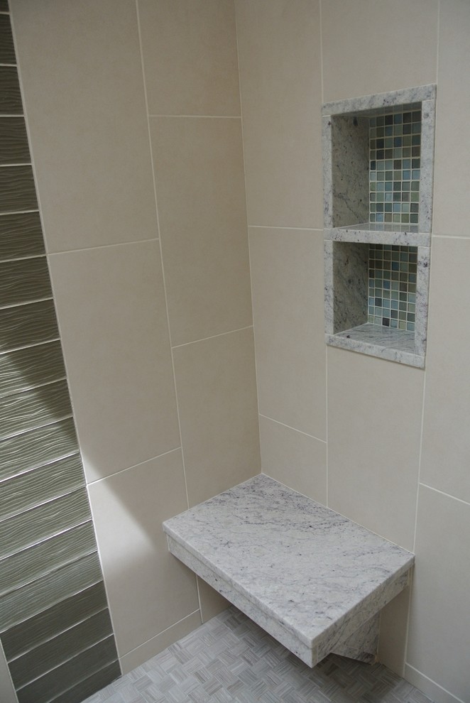 Transitional bathroom photo in Boston with granite countertops