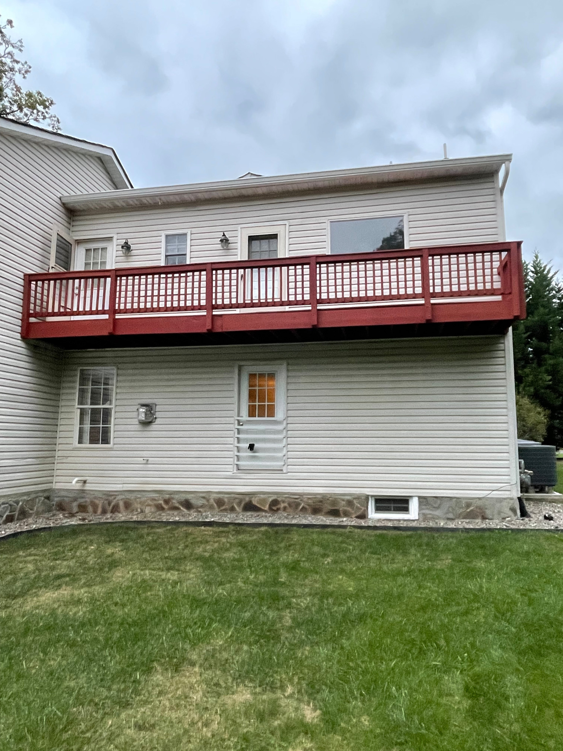 Deck stain and masonry repairs