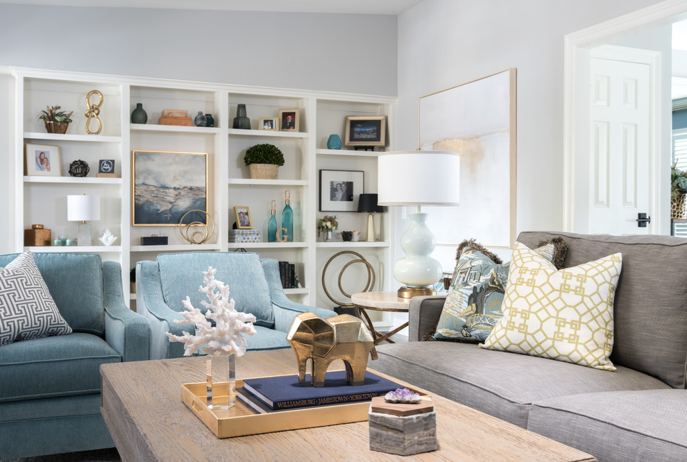Living room - mid-sized traditional enclosed medium tone wood floor and brown floor living room idea in Dallas with white walls, a standard fireplace, a stone fireplace and a wall-mounted tv
