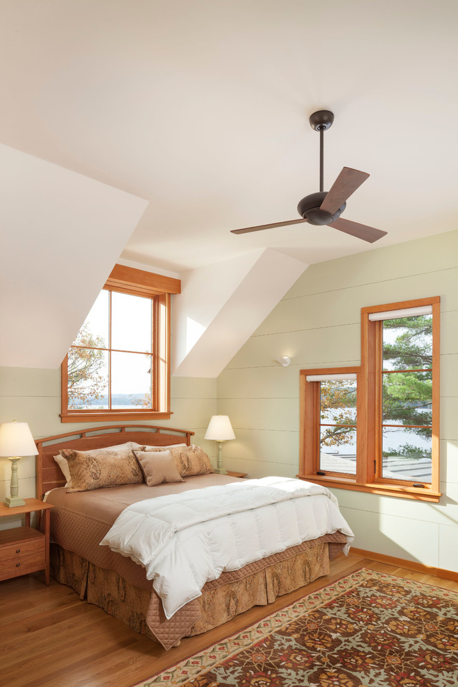 Design ideas for a country bedroom in Portland Maine with green walls.