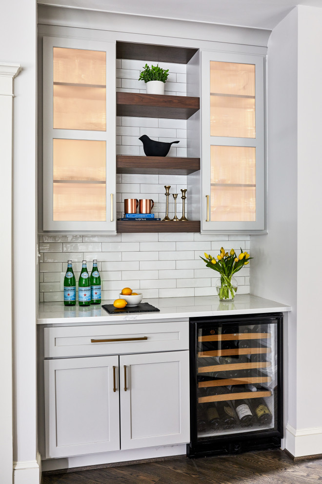 Inspiration for a transitional home bar remodel in Boston