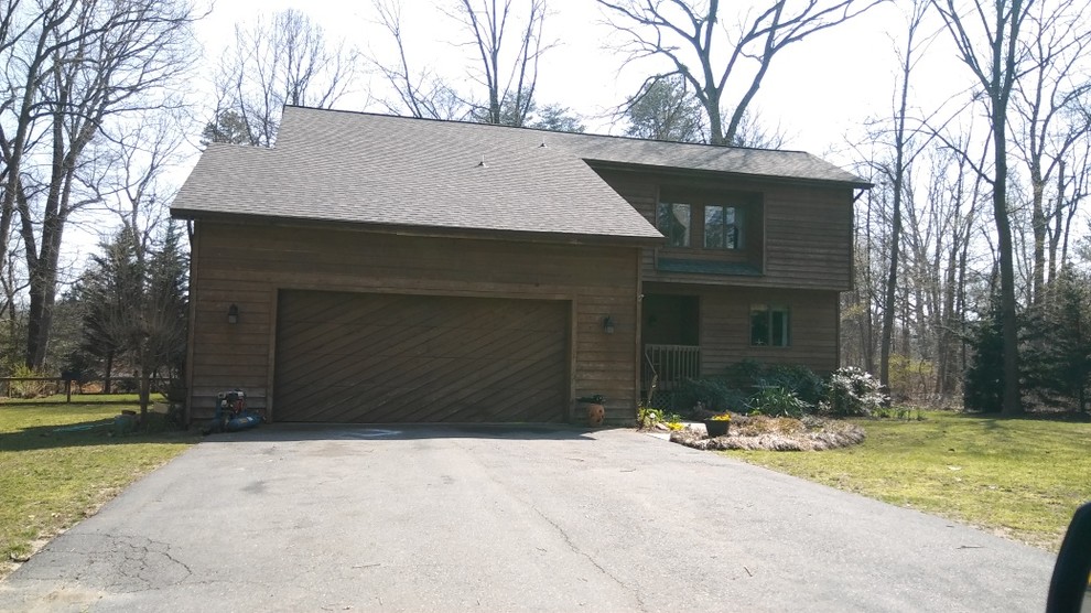 move garage door opening from front of house to side