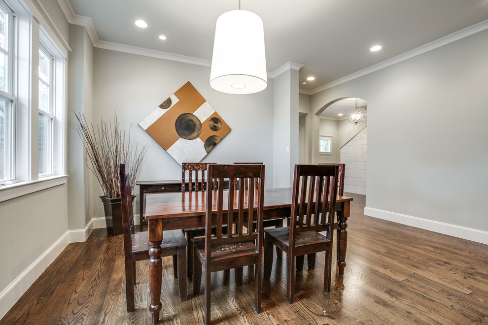 Example of a transitional dining room design in Dallas