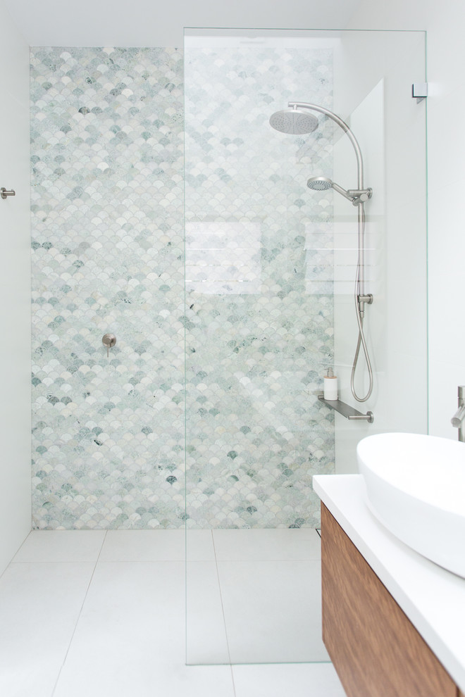 Inspiration for a mid-sized contemporary master bathroom in Sydney with green tile, mosaic tile, white walls, porcelain floors, a vessel sink, engineered quartz benchtops, white floor, an open shower and white benchtops.