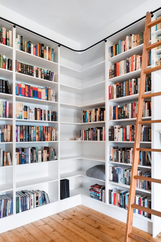 Inspiration for a large contemporary home office in Melbourne with a library.