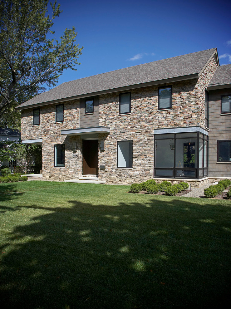 Design ideas for a transitional exterior in Detroit with stone veneer.
