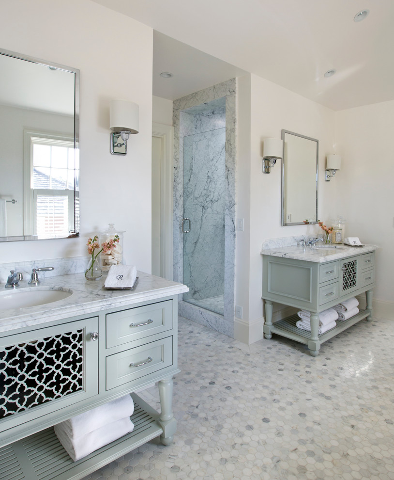 Inspiration for a large contemporary master bathroom in San Francisco with an undermount sink, an alcove shower, white walls, marble floors, white floor, a hinged shower door, grey cabinets, a freestanding tub, marble benchtops and recessed-panel cabinets.