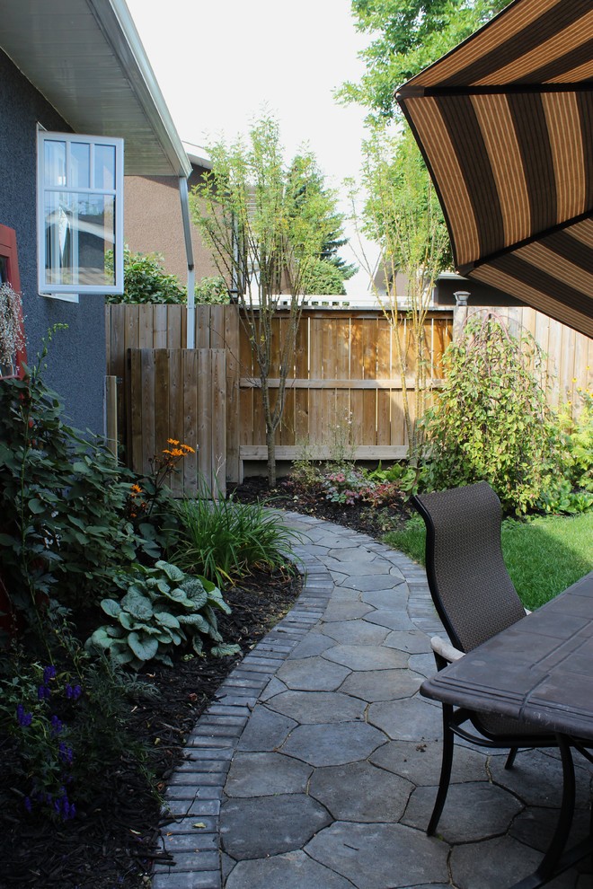 Photo of a transitional garden in Calgary.