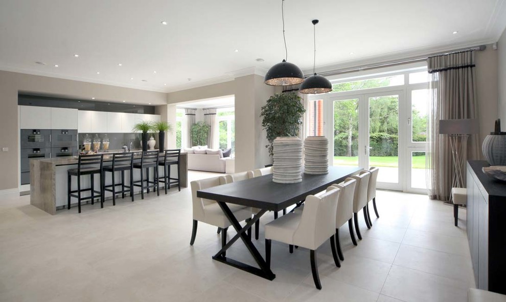 Inspiration for a contemporary kitchen/dining combo in Surrey with grey walls.