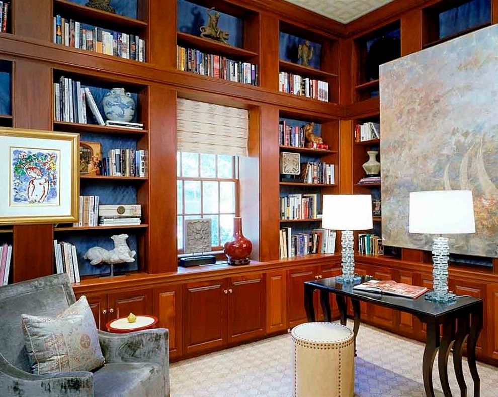 Design ideas for a large traditional home office in DC Metro with a library, brown walls, carpet, no fireplace, a freestanding desk and beige floor.