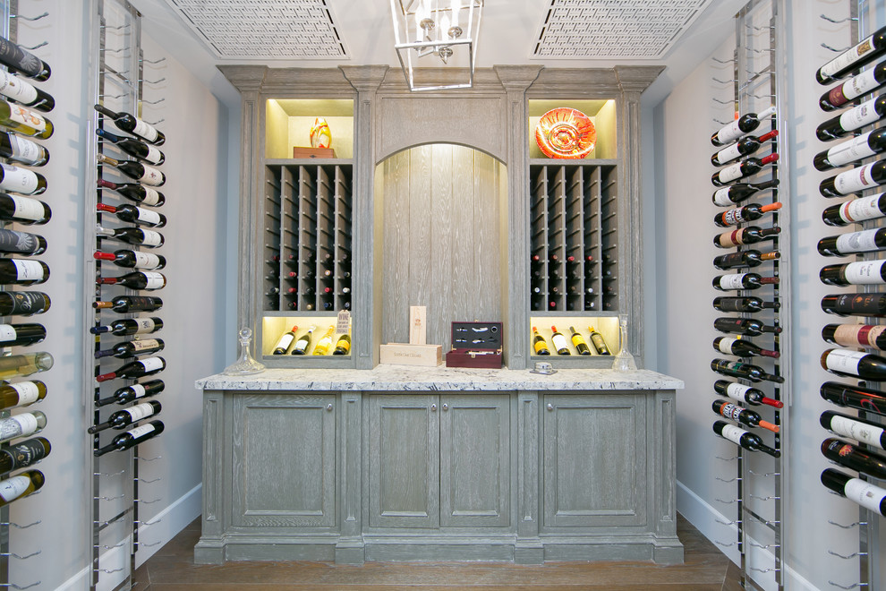 Inspiration for a transitional wine cellar in Orange County.